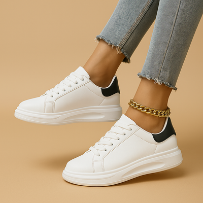 Witte leren sneakers met minimalistisch design voor dames | Jinte